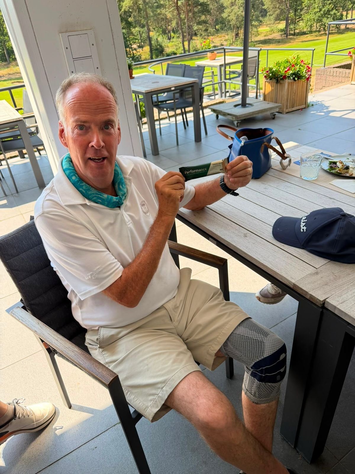 A golfer with a Parformance bar at the clubhouse