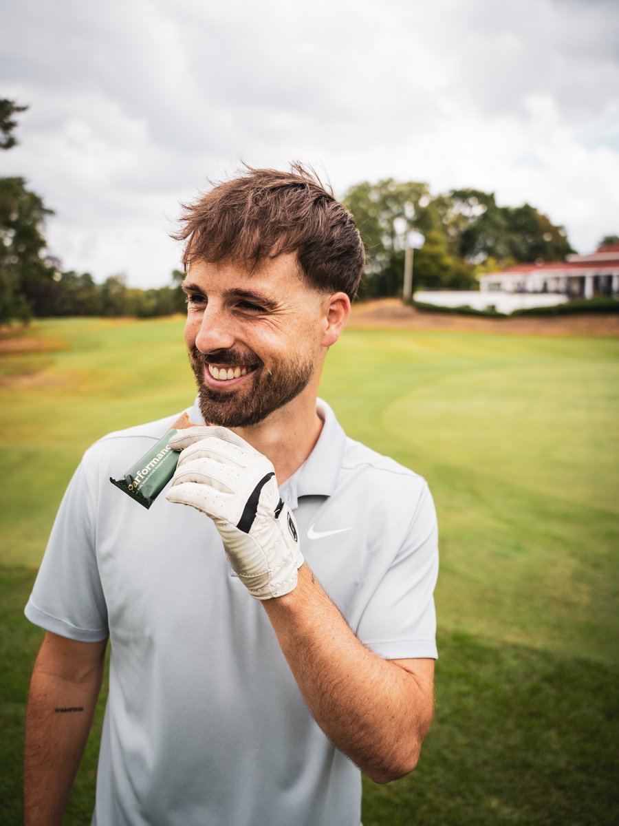 A golfer enjoying a bar on the course